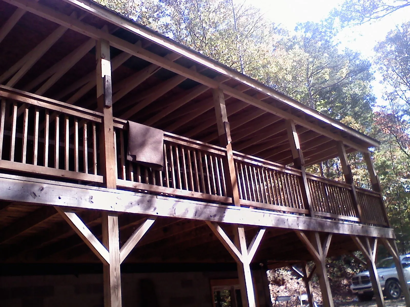 Timber framing under a new elevated porch and deck — Roof Leak Repair in Mustang by Roofing Brothers